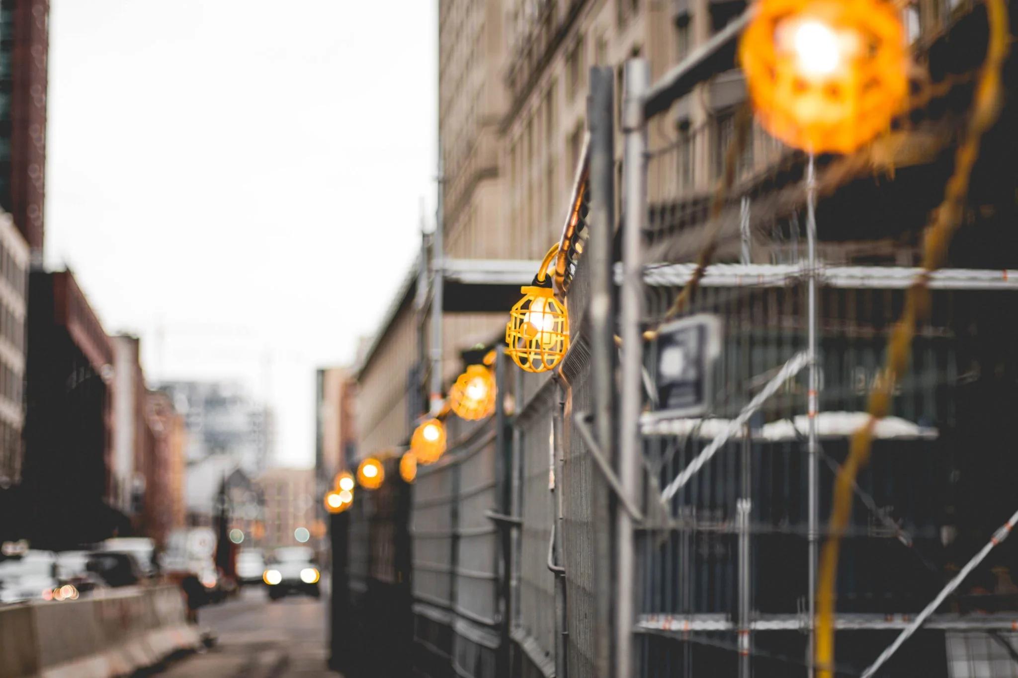 Construction site safety lights on a city project for contractor business coaching content